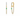 A pair of gold huggie hoop earrings with dangling chains set with clear pavé stones and a single round green emerald accent on each earring, shown against a plain white background.